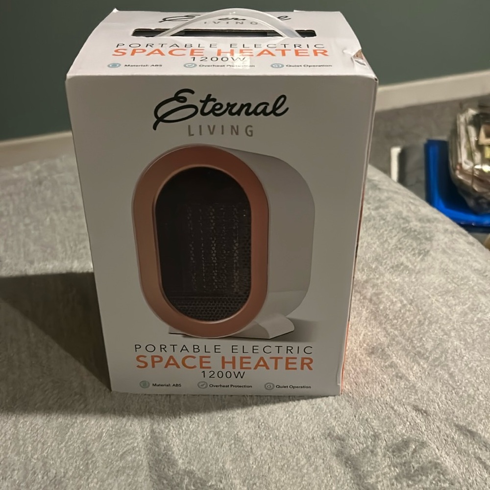 Space heater by external living in a box never opened and it’s cute